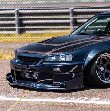 URAS | Type-GT Front Bumper for Nissan R34 Skyline 4 Door – Parts