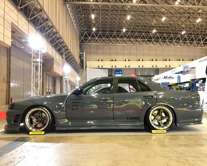 URAS | Super Wide Aero System Front Bumper for Nissan R34 Skyline 4Dr