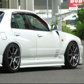 URAS | Type-R Side Skirts for Nissan R34 Skyline 4 Door