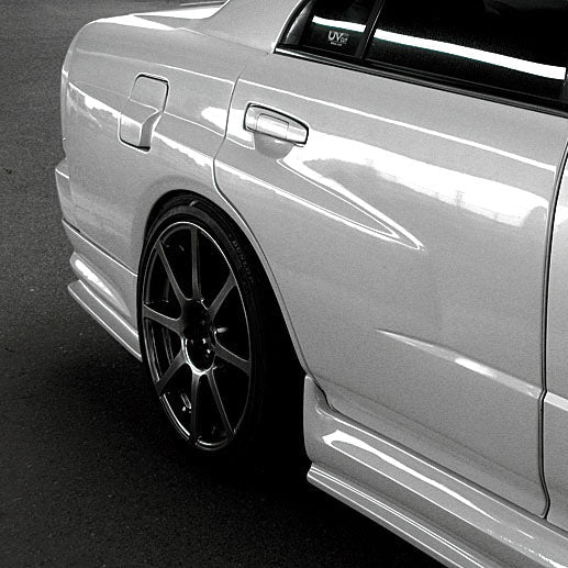 URAS | Type-R 20mm Rear Fenders for Nissan R34 Skyline 4 Door
