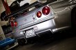 Do-Luck | Carbon Rear Wing Stays - Pair for Nissan Skyline GT-R (R34)