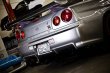 Do-Luck | Carbon Rear Wing Stays - Pair for Nissan Skyline GT-R (R34)